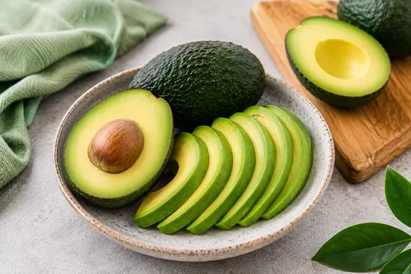 Fresh sliced avocados in a bowl as a healthy superfood for weight loss and nutritious eating