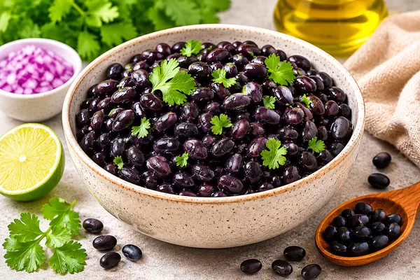 Black beans in a bowl garnished with fresh cilantro as a healthy superfood for weight loss and healthy eating