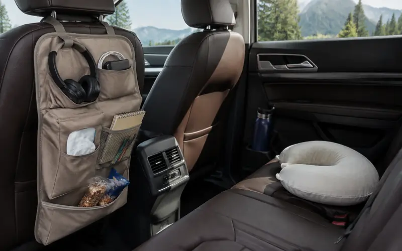 Organized back seat with entertainment and travel essentials for a long drive