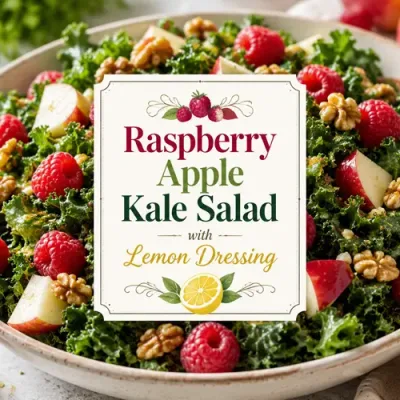 Fresh raspberry apple kale salad topped with toasted walnuts and a light lemon dressing.