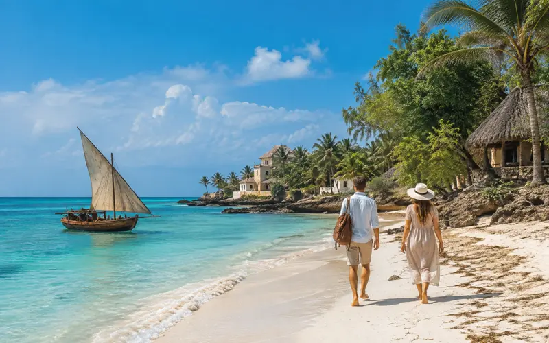 Travelers walking beside turquoise water and white sand along a tropical African-inspired coastline.