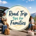 Road trip scene with a packed SUV, family, luggage, and centered text that says Road Trip Tips for Families.