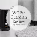 WOPet Guardian Dog Treat Camera in a gray and white living room with overlay text reading WOPet Guardian Review Dog Treat Camera.
