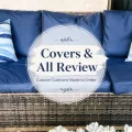 Navy outdoor patio couch cushions with striped pillows and a centered Covers & All Review overlay.