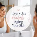 Everyday habits aging your skin featured image with woman applying skincare