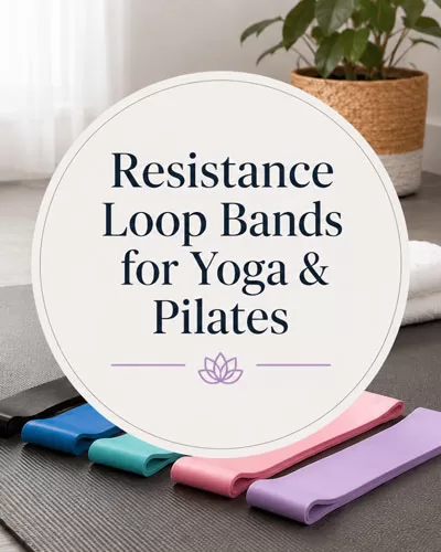 Resistance loop bands on a yoga mat with a water bottle, Pilates ball, towel, and centered title graphic for yoga and Pilates.