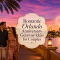 Featured image Romantic couple walking along an Orlando waterfront at sunset with fireworks, palm trees, and glowing evening lights.