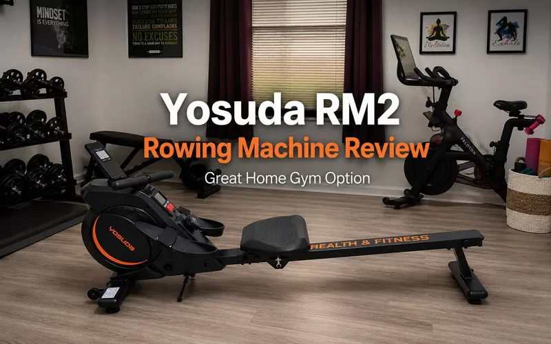 Yosuda RM2 rowing machine review featured image showing a compact rowing machine in a home gym workout room with fitness equipment and motivational wall decor.