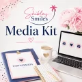 Media Kit image for Shibley Smiles featuring a soft feminine workspace with laptop, coffee, notebook, partnership folder, pink flowers, and simple Media Kit text.