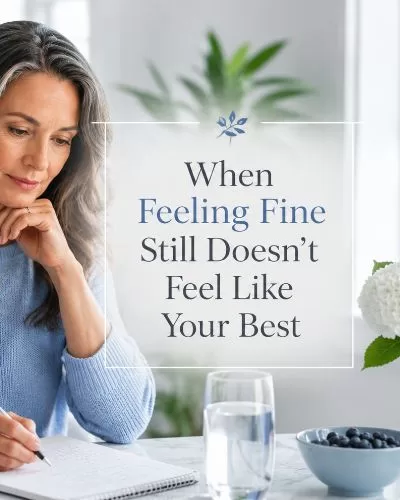 Woman writing in a wellness journal beside title text that reads When Feeling Fine Still Doesn’t Feel Like Your Best.