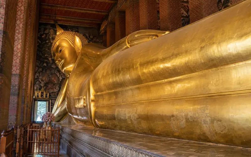 Golden Reclining Buddha inside Wat Pho in Bangkok
